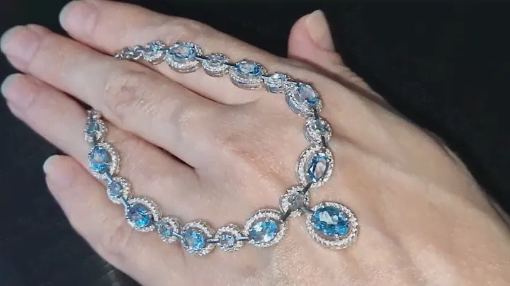 Серебряное ожерелье с голубыми топазами